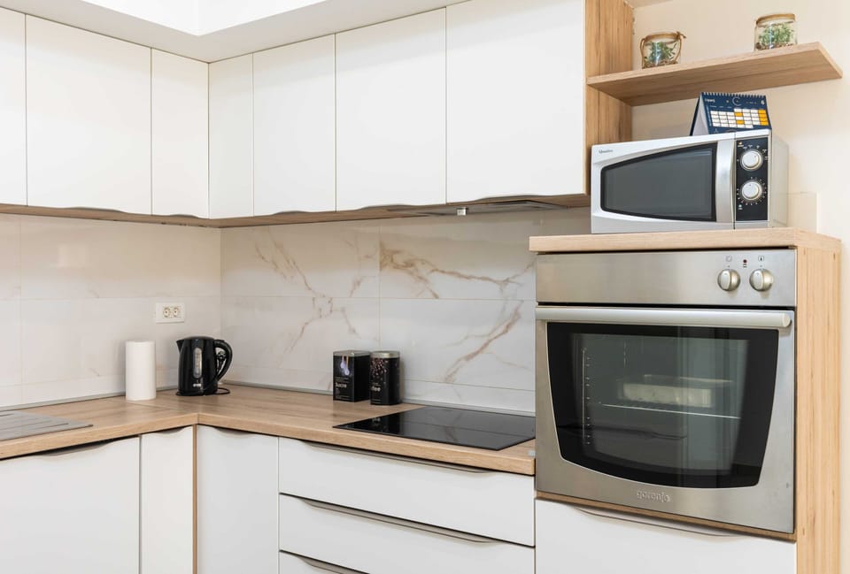 Apartment (Two Bedroom Apartment with Balcony) | Private kitchen | Fridge