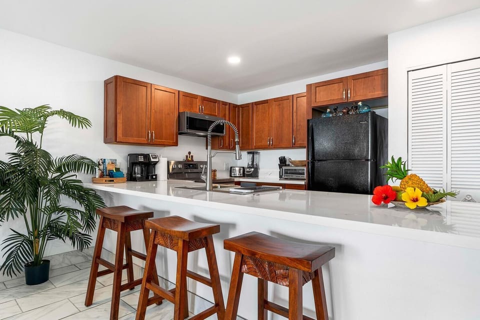 The breakfast bar is perfect for quick meals or chatting with the chef.