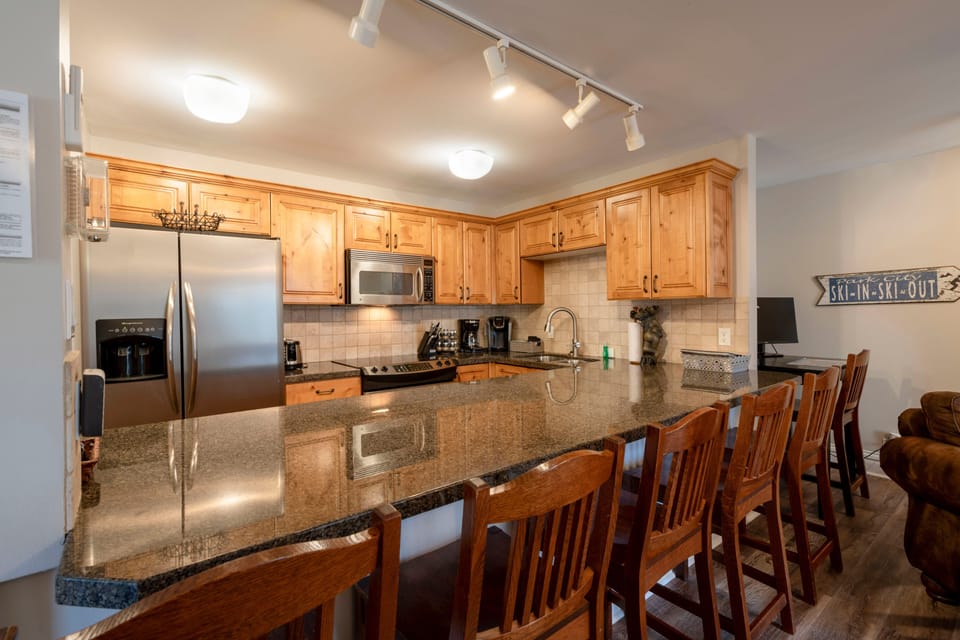 Dishwasher; glass-top electric stove, microwave; Refrigerator, small appliances