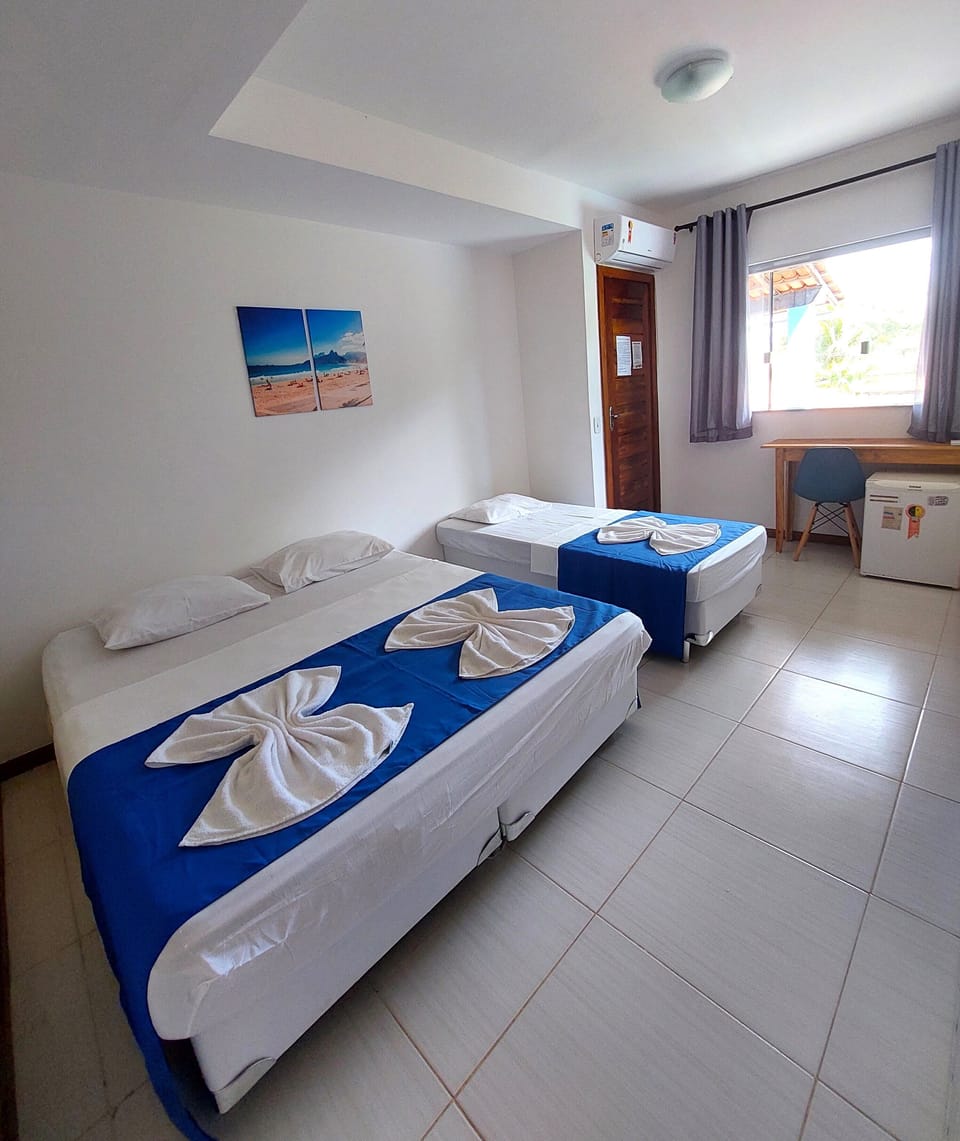 Standard Triple Room, Private Bathroom | Desk, laptop workspace, iron/ironing board, free WiFi