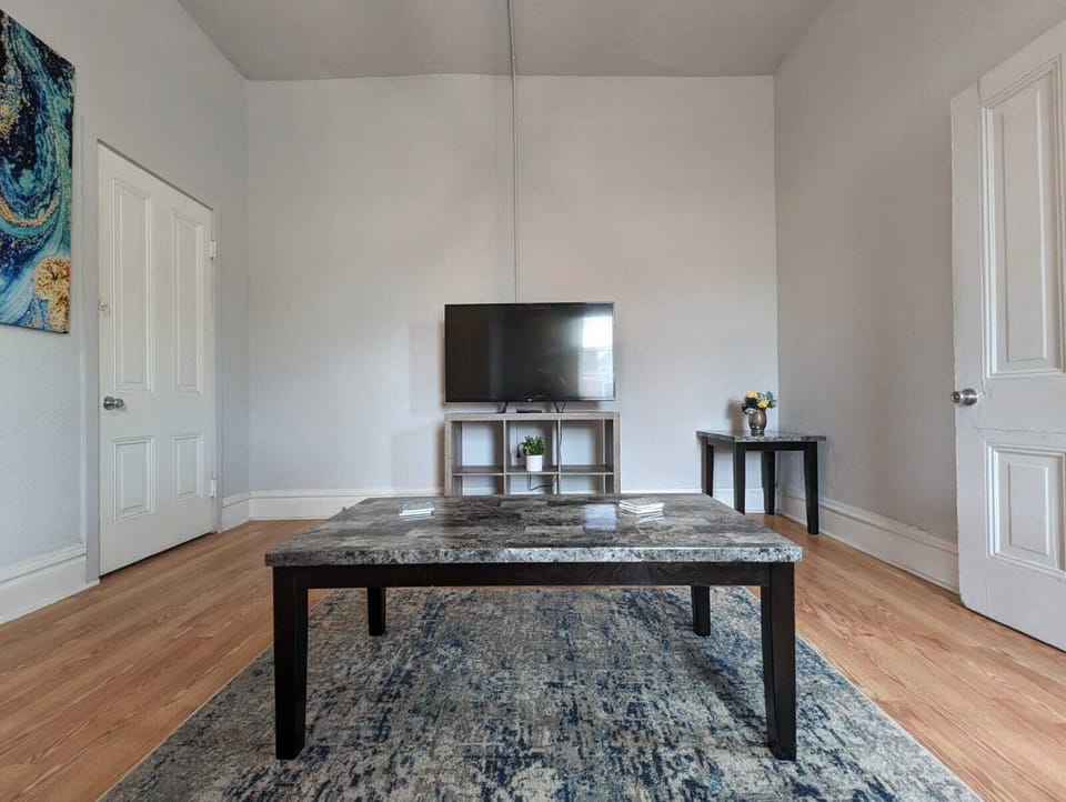 A beautiful and cozy living room while watching your favorite TV show or movie!