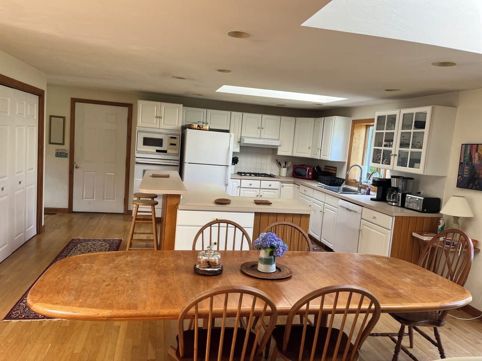 Dining table and kitchen