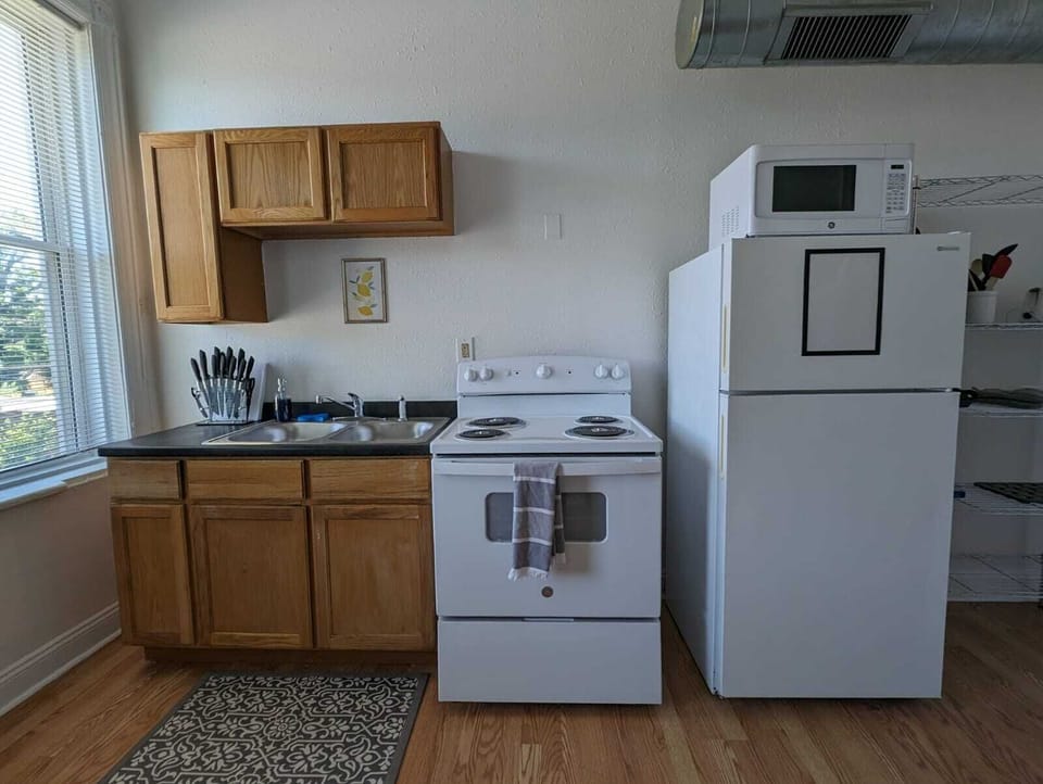 Our kitchen is cozy, where you can enjoy cooking delicious food!