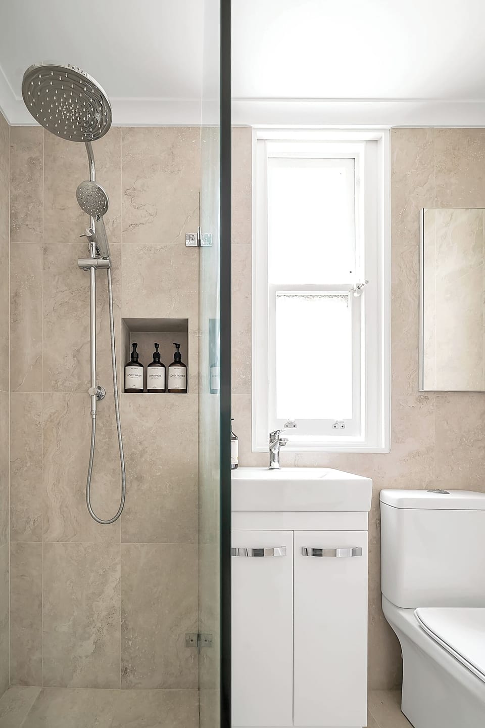 Walk in shower with basin and toilet