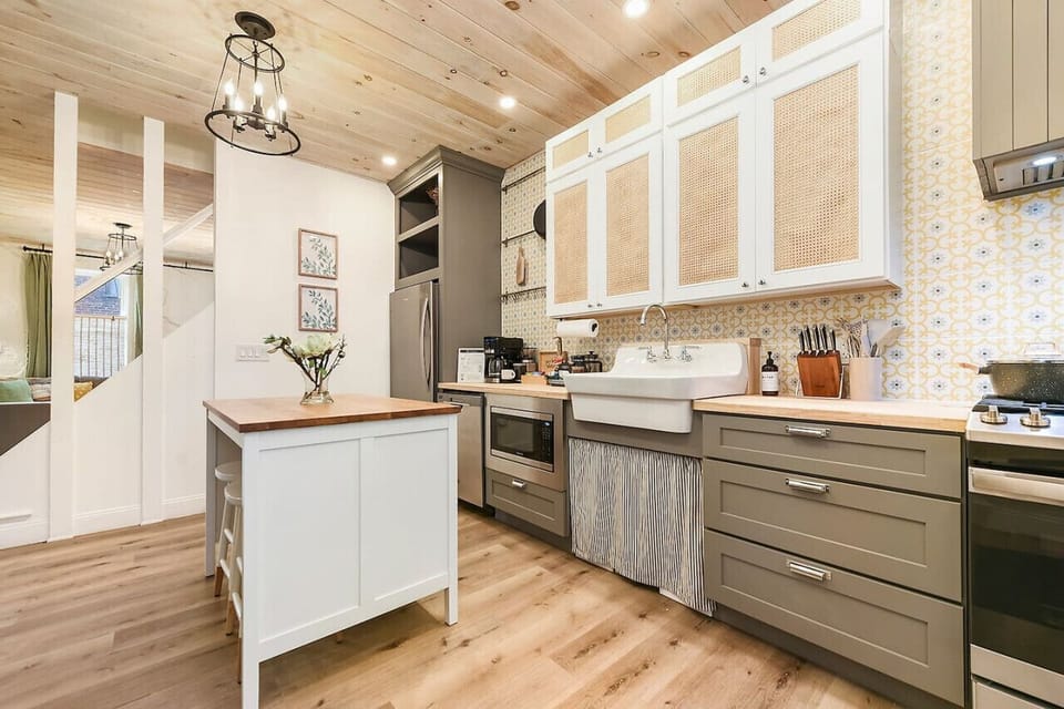 Fully stocked kitchen with island—perfect for cooking in