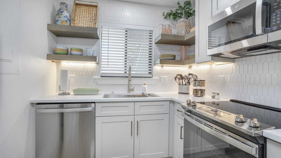 Cook in style! Our updated kitchen boasts contemporary features and ample space, making meal preparation a joy.