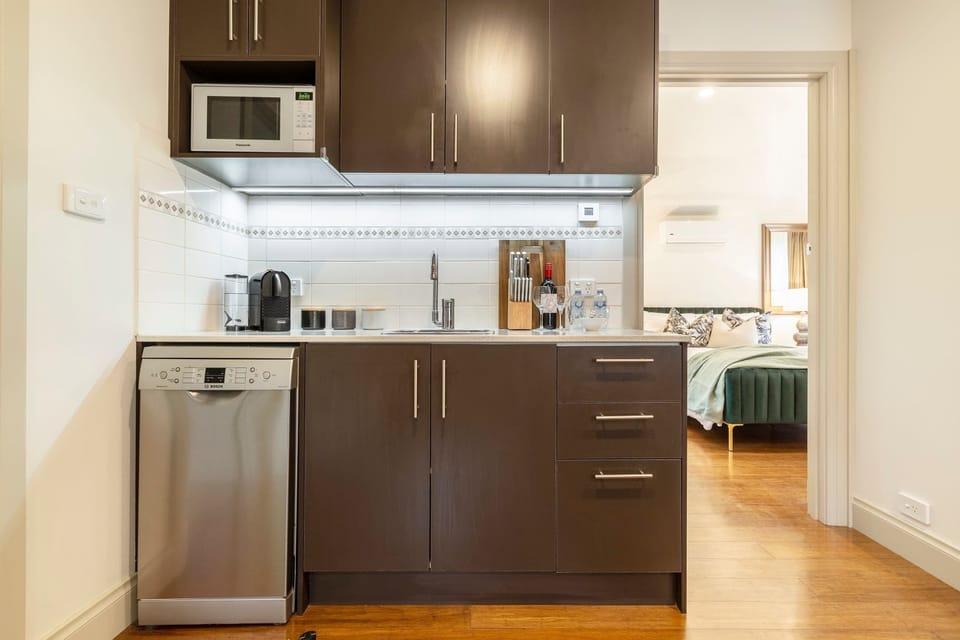 Kitchenette at Little Audrey Guest House: A functional kitchen space designed for convenience and style