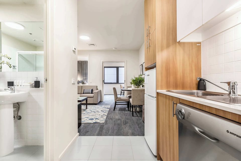 KITCHENETTE: Equipped for easy dining with essentials to reheat, prepare, and enjoy simple meals at home