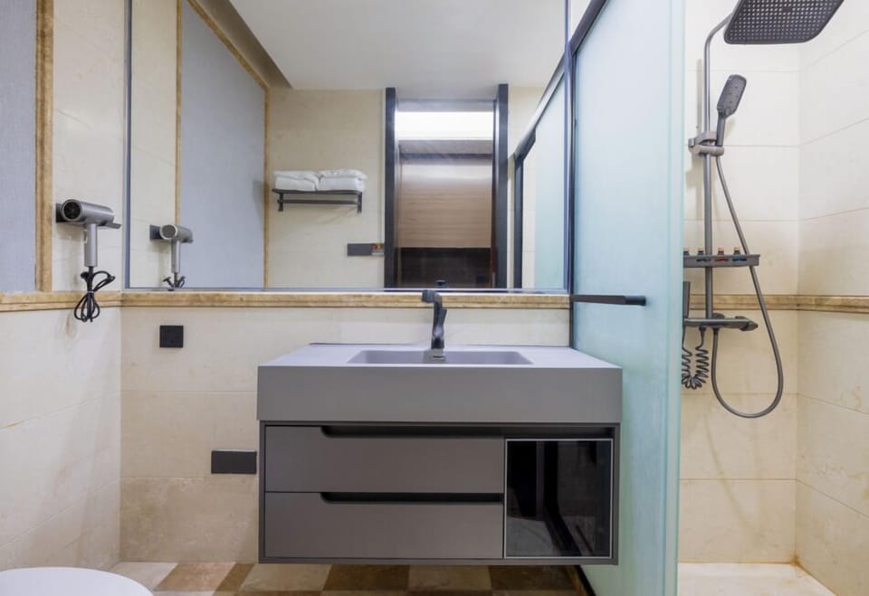 Superior Single Room | Bathroom | Shower, hydromassage showerhead, designer toiletries, hair dryer