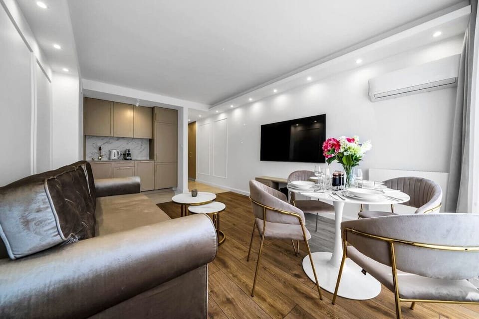 Comfortable Living Room with Sofa Bed and Smart TV | Book Now with RENTUJEMY