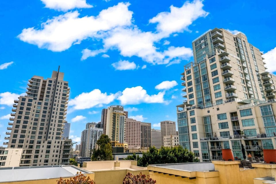Expansive city skyline views showcasing the surrounding architecture & lively downtown atmosphere.