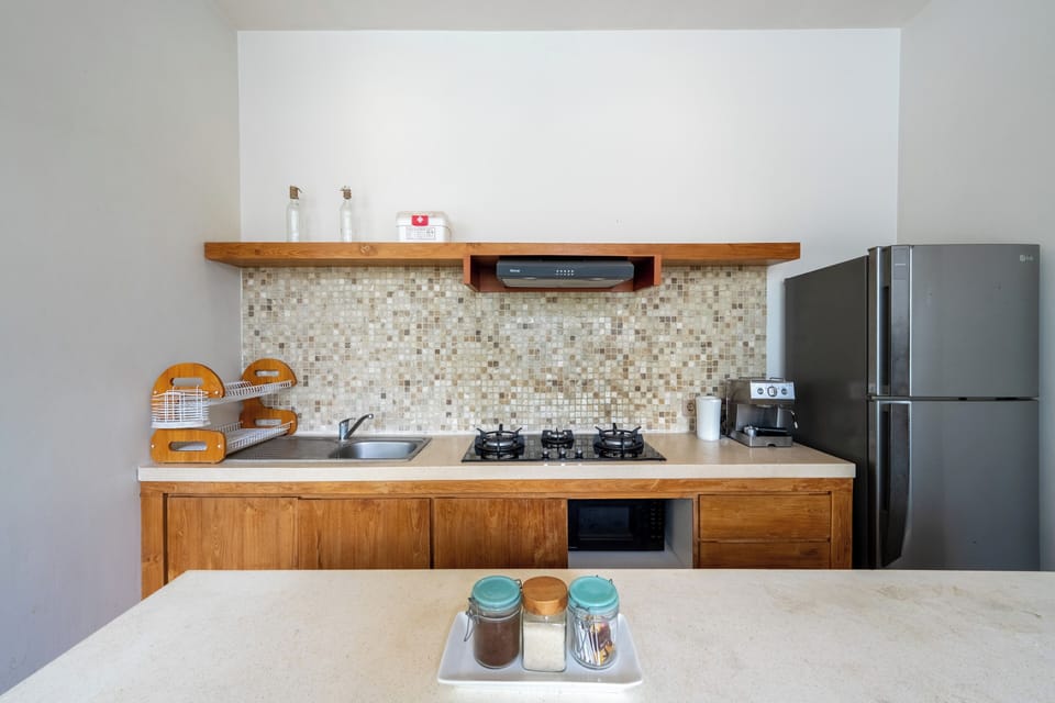 Deluxe Villa, Pool View | Private kitchen | Electric kettle, highchair