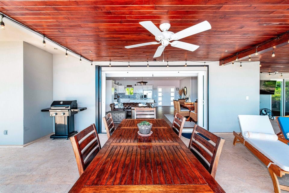 Enjoy breathtaking sunsets from the poolside BBQ area with stunning views