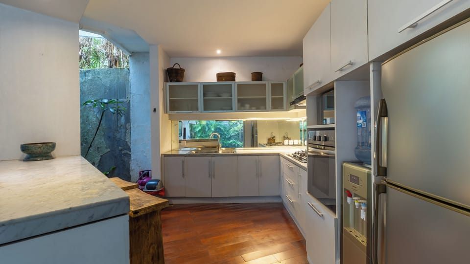 Villa | Private kitchen | Fridge, microwave, oven, stovetop