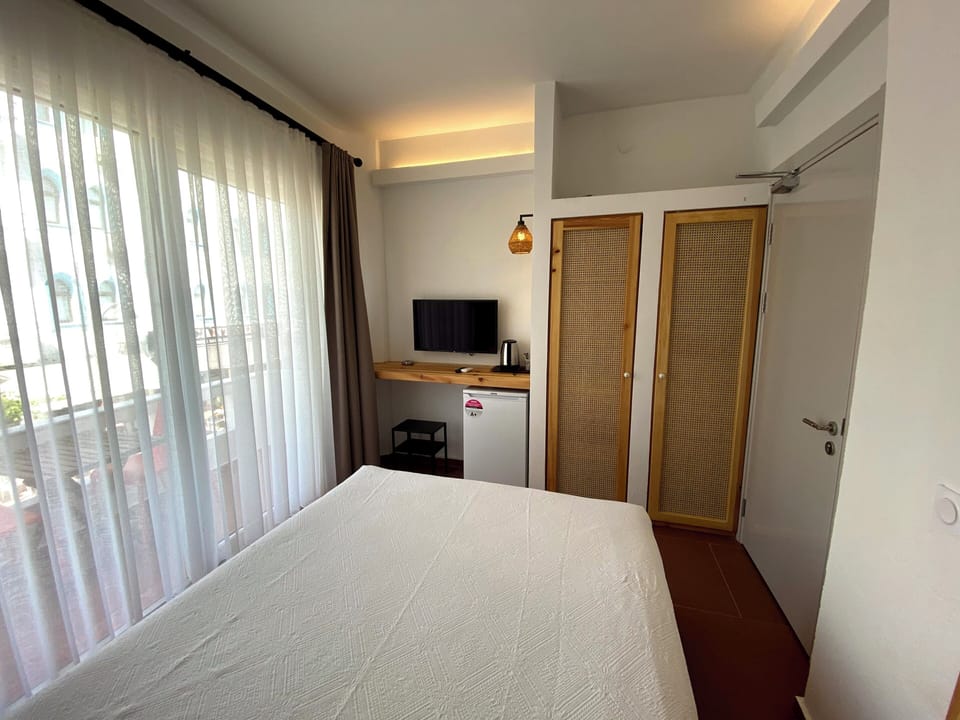 Standard Double Room, Balcony, City View | Blackout drapes, iron/ironing board, free WiFi, bed sheets