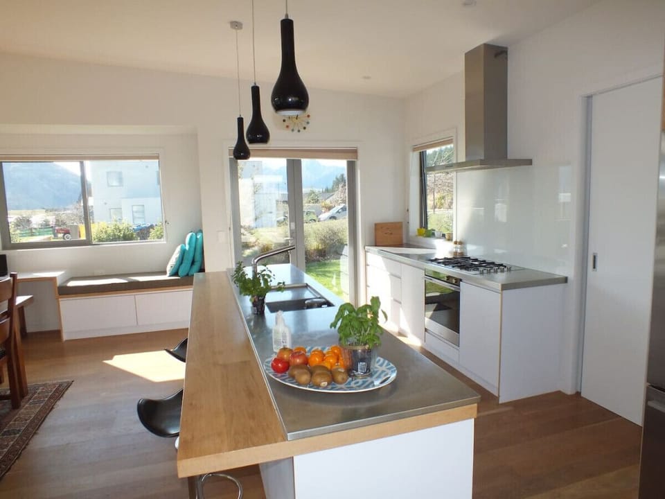 Large kitchen with gas elements for cooking.