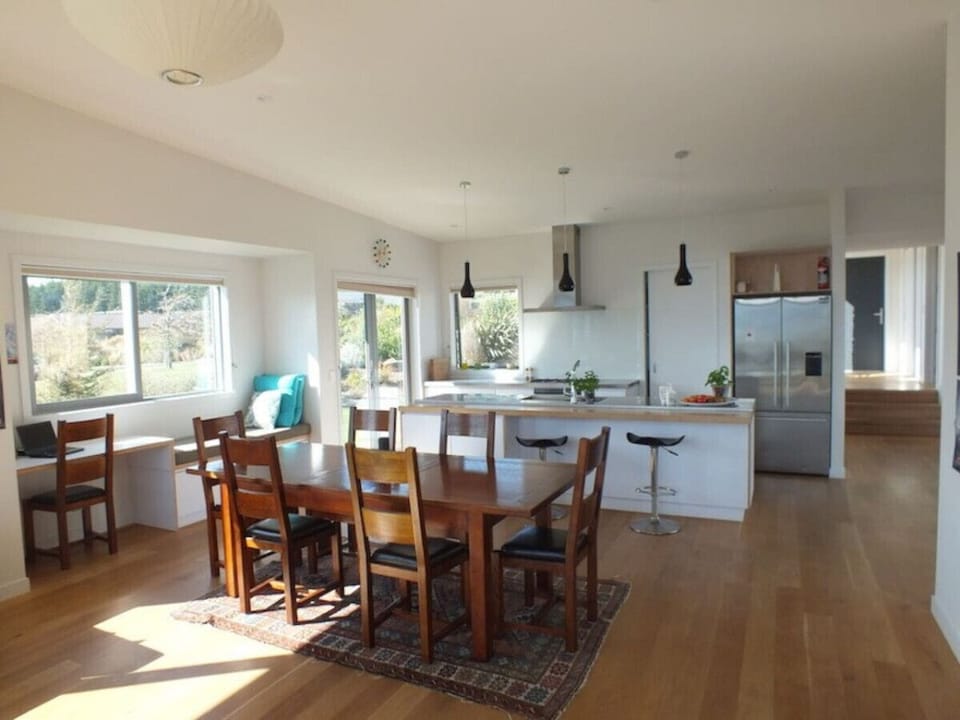 Open Plan kitchen and dining room with lots of light, and high ceilings.