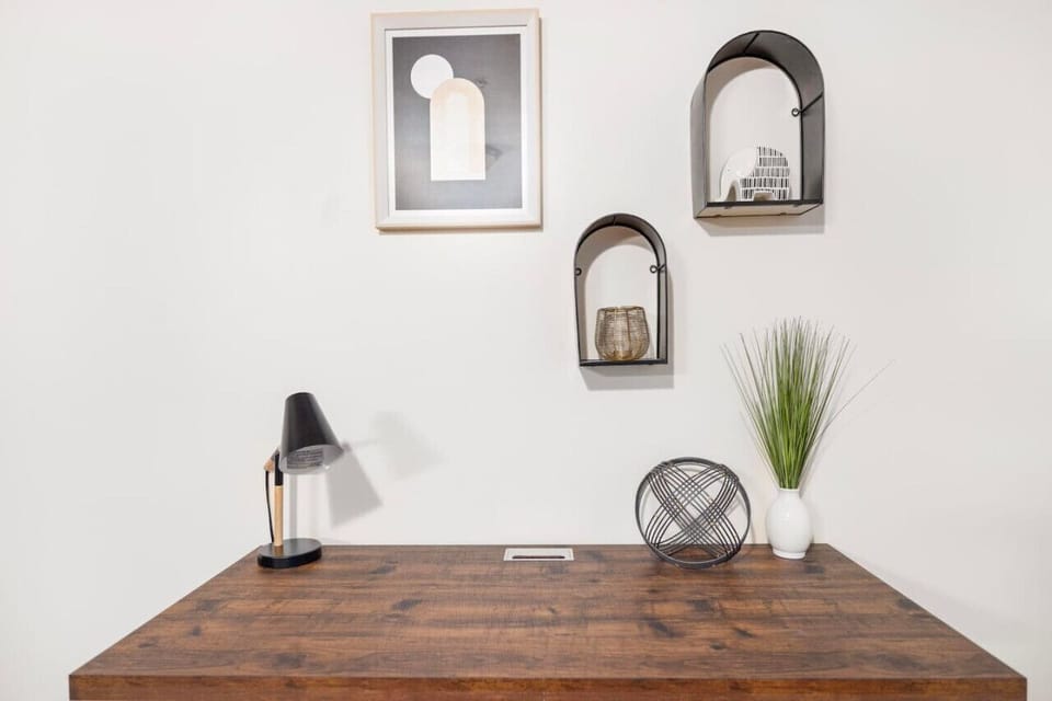 Stay productive in the sleek work area, designed for comfort and convenience while you tackle your tasks.