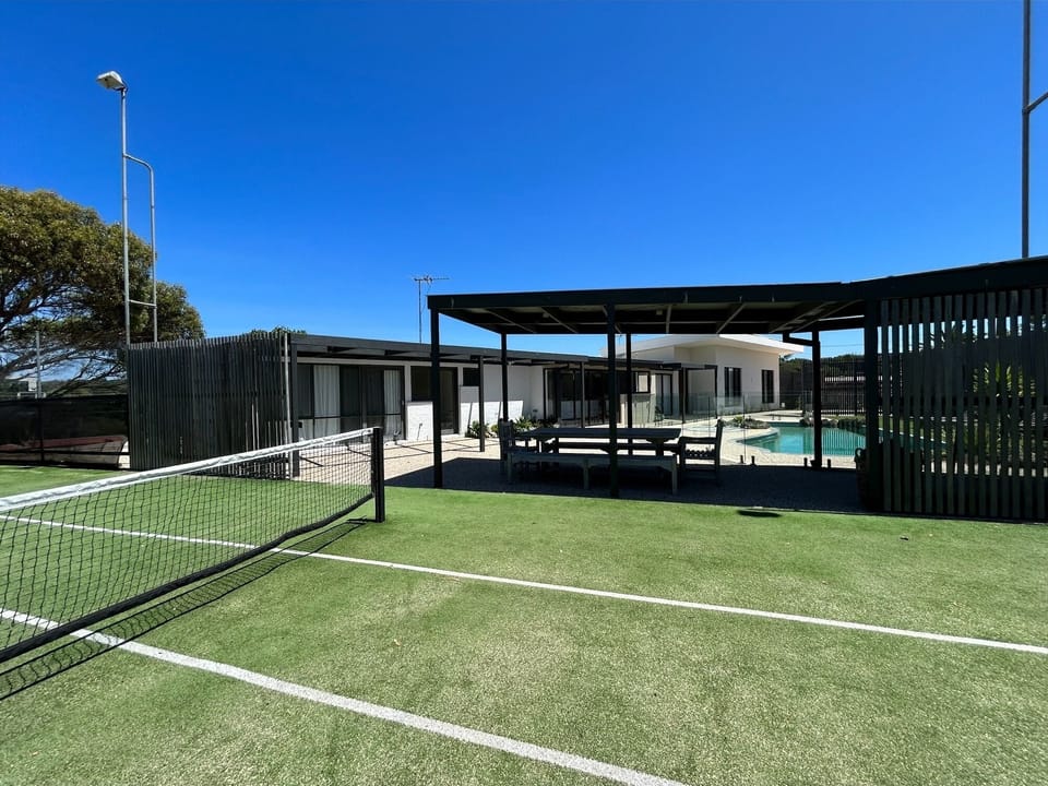 Full Size Tennis Court & Basketball Ring
