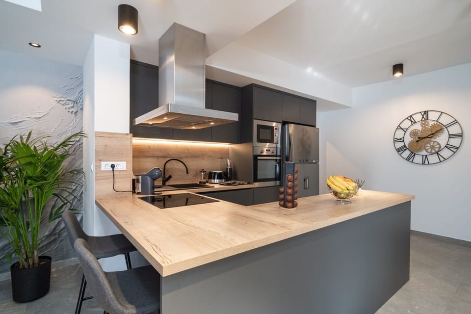 Exclusive Villa | Private kitchen | Full-size fridge, microwave, oven, stovetop