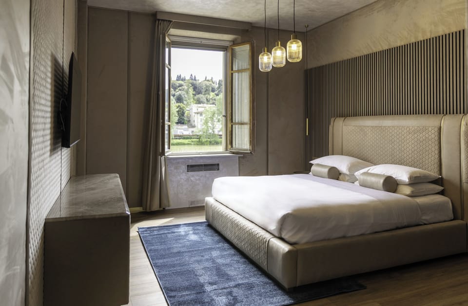 Premium bedding, down comforters, memory foam beds, free minibar