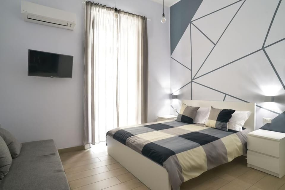 Deluxe Quadruple Room | Individually decorated, individually furnished, desk, soundproofing