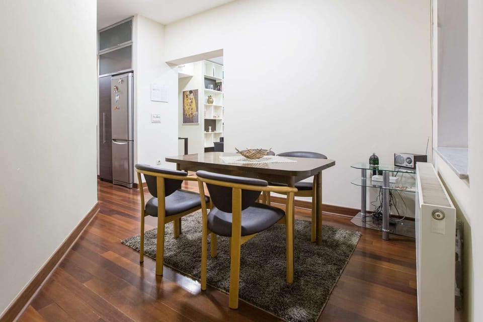 Dining area for 4-5 persons and the living room and the kitchen in the back