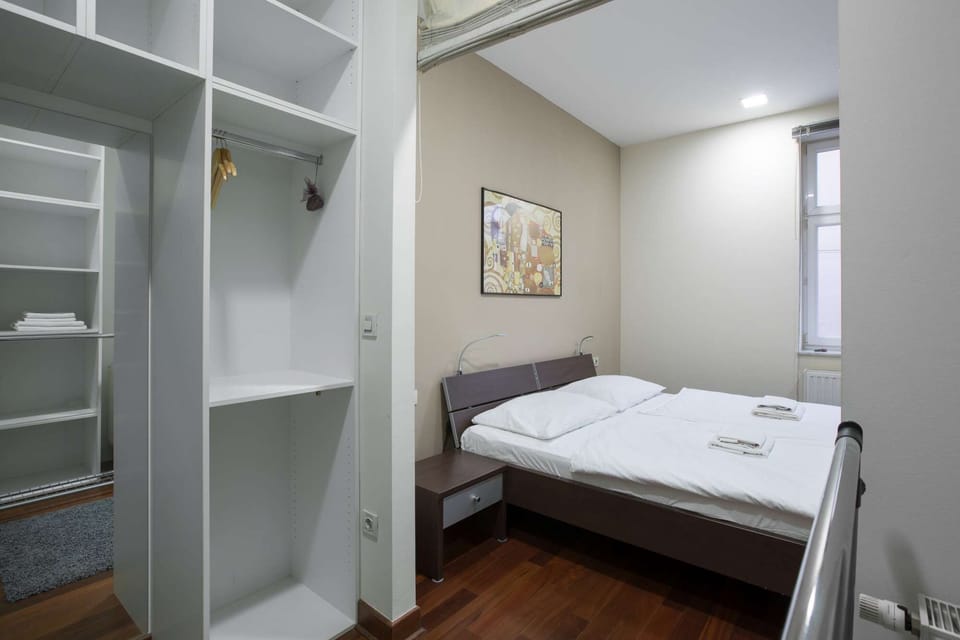 View form walk in closet to the double bed.