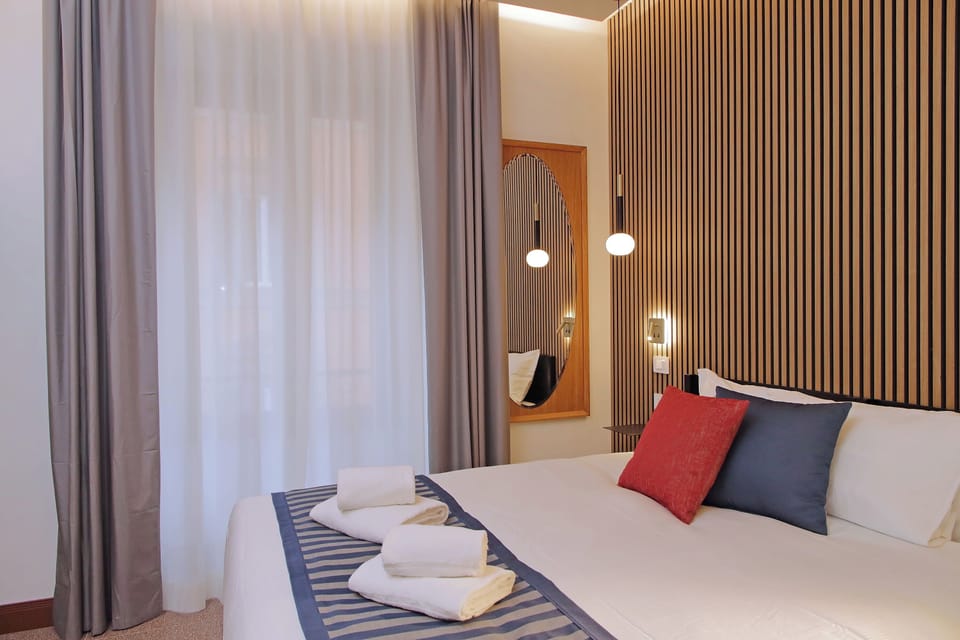 Classic Double Room, City View | Free minibar items, in-room safe, desk, laptop workspace