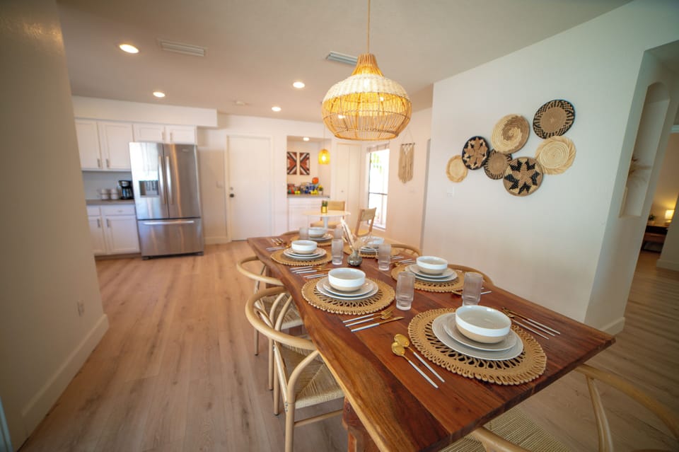 Open concept kitchen/dining w/ boho decor