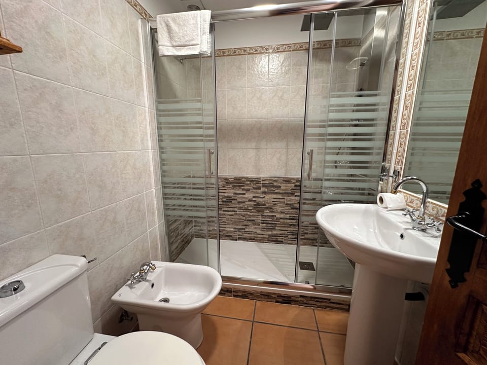 Deluxe Suite, Balcony, Mountain View | Bathroom | Hydromassage showerhead, bidet, heated floors