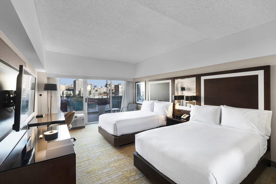 Hypo-allergenic bedding available, in-room safe, desk, laptop workspace