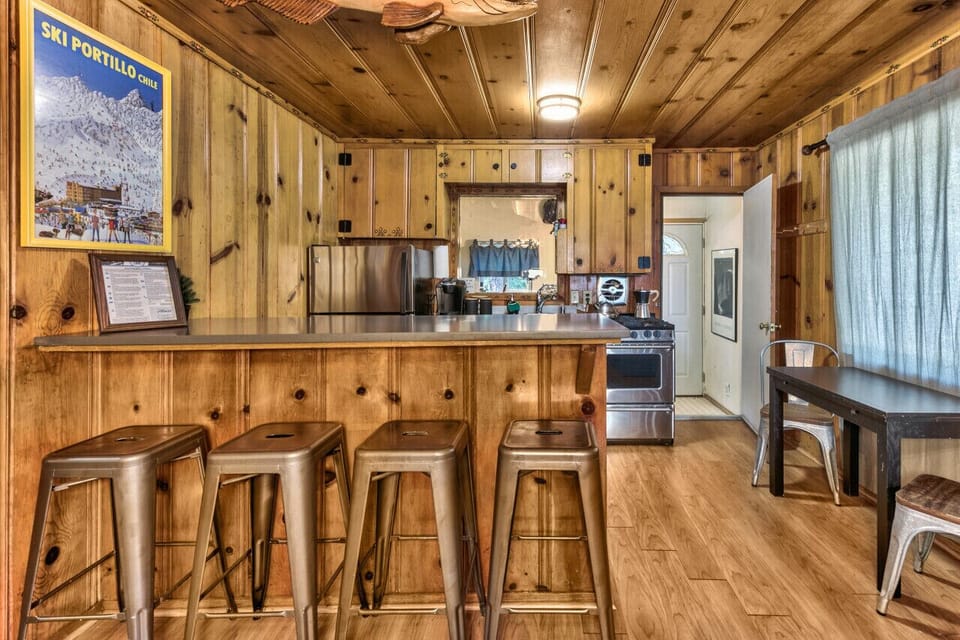Nicely appointed kitchen adjacent to living room.