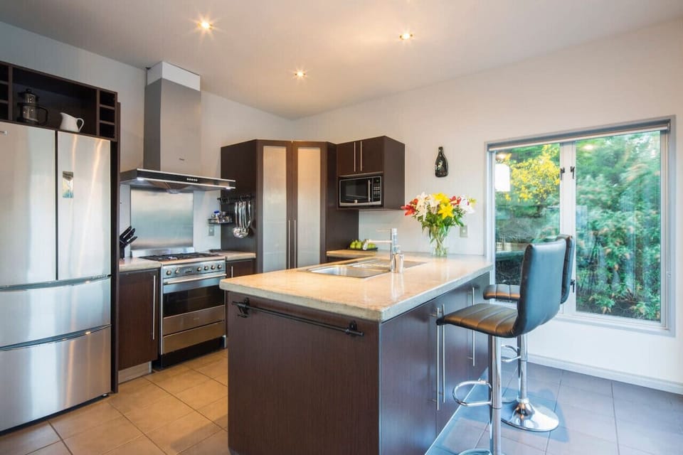 Well-equipped modern kitchen, including a coffee machine