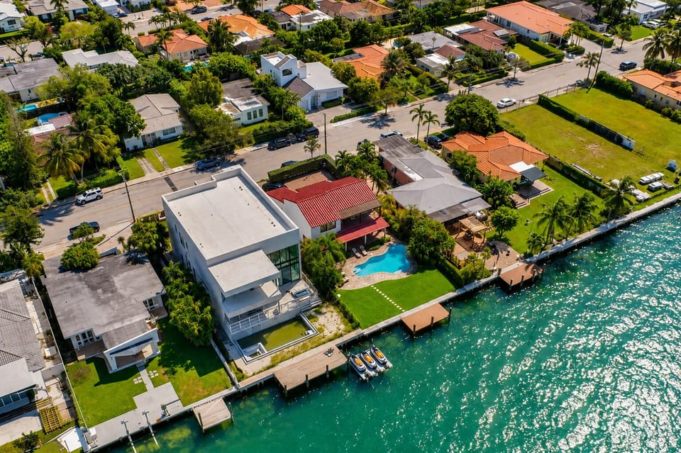 Waterfront retreat with private dock, canal views, and tropical surroundings