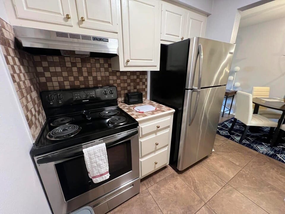 Kitchen includes all cookware and dining ware