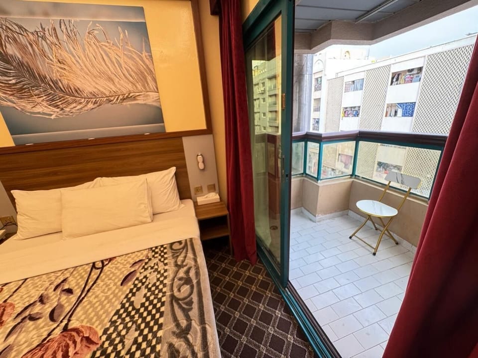 Standard Double Room, City View | Laptop workspace, free WiFi, bed sheets