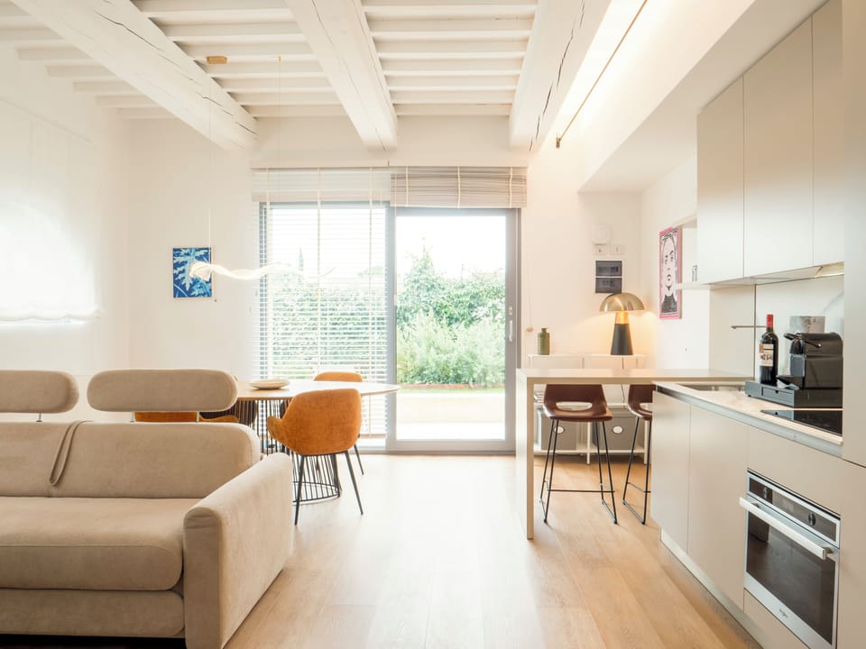 Suite, 1 King Bed with Sofa bed, Non Smoking, Pool View | Living area | 43-inch Smart TV with cable channels