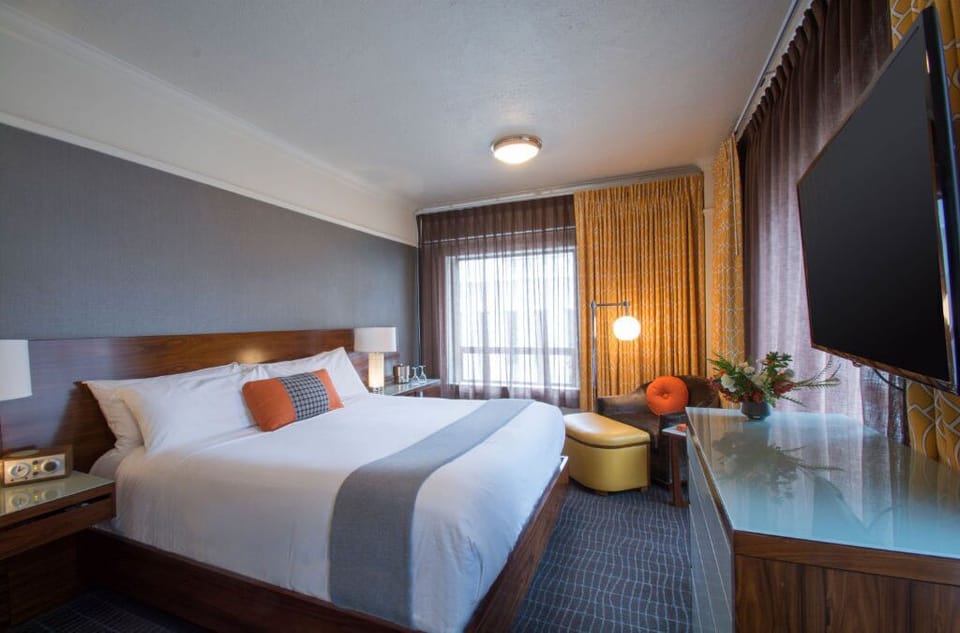 Bright and spacious superior room featuring a king-sized bed, perfect for unwinding after a day of exploration.