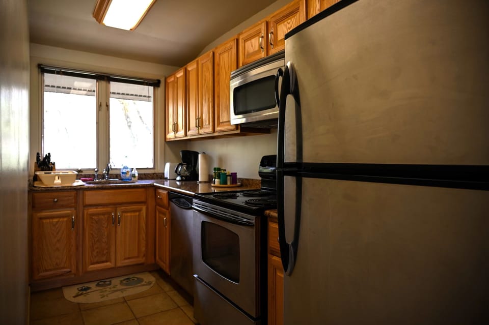 Galley-style kitchen stocked with all the essentials