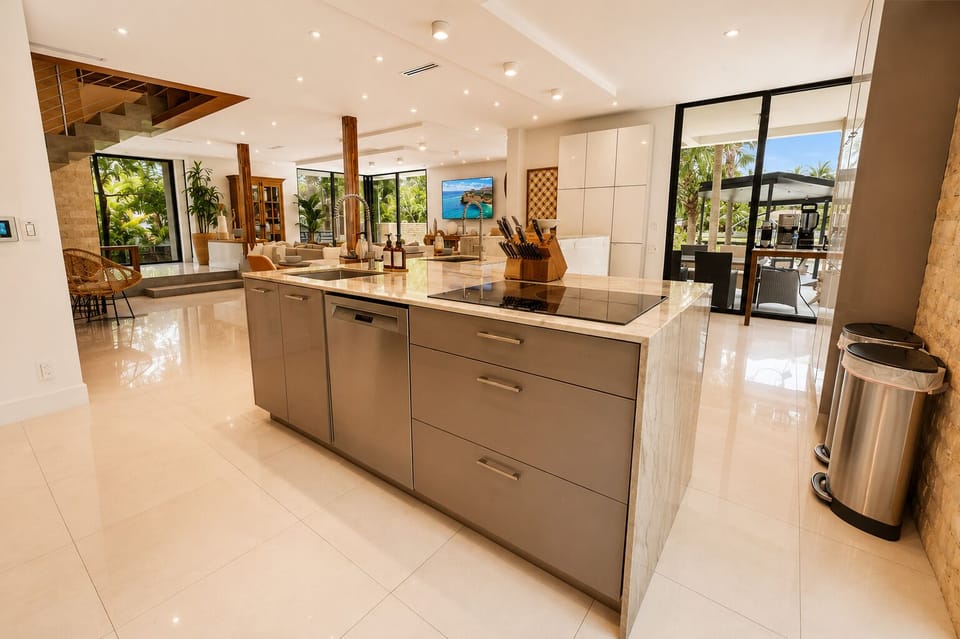 Bright open-concept kitchen with luxe island and seamless indoor-outdoor flow
