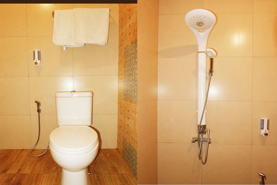 Standard Double Room | Bathroom | Shower, towels, soap