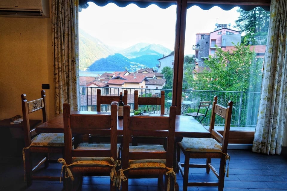 Apartment, Balcony, Lake View | Dining room