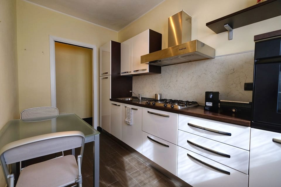 Apartment, Balcony, Lake View | Private kitchen | Full-size fridge, oven, stovetop, espresso maker