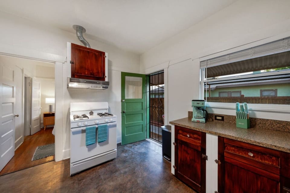Updated, well-equipped kitchen with access to back patio