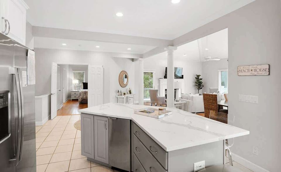 Open concept second floor living room, dining room and kitchen