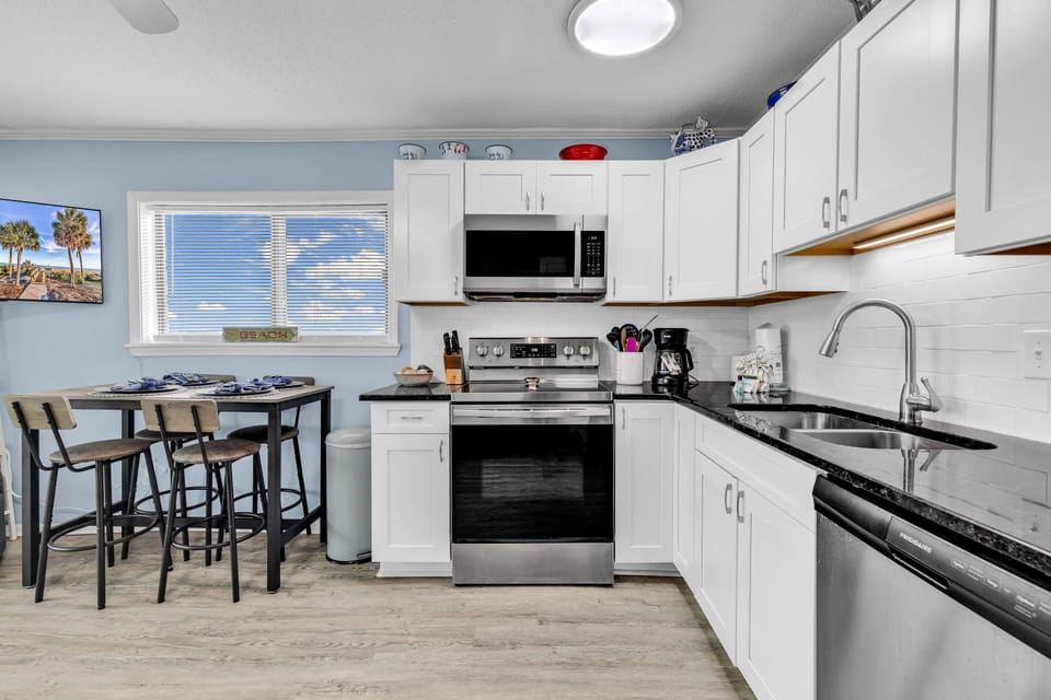 Signature Condo, Beach View | Private kitchen | Fridge, microwave, oven, stovetop