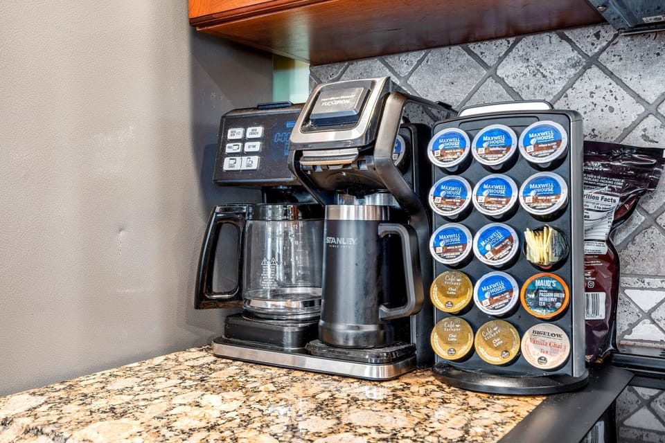 Brew a cup of joe in the morning and head on out to the pool couches to relax