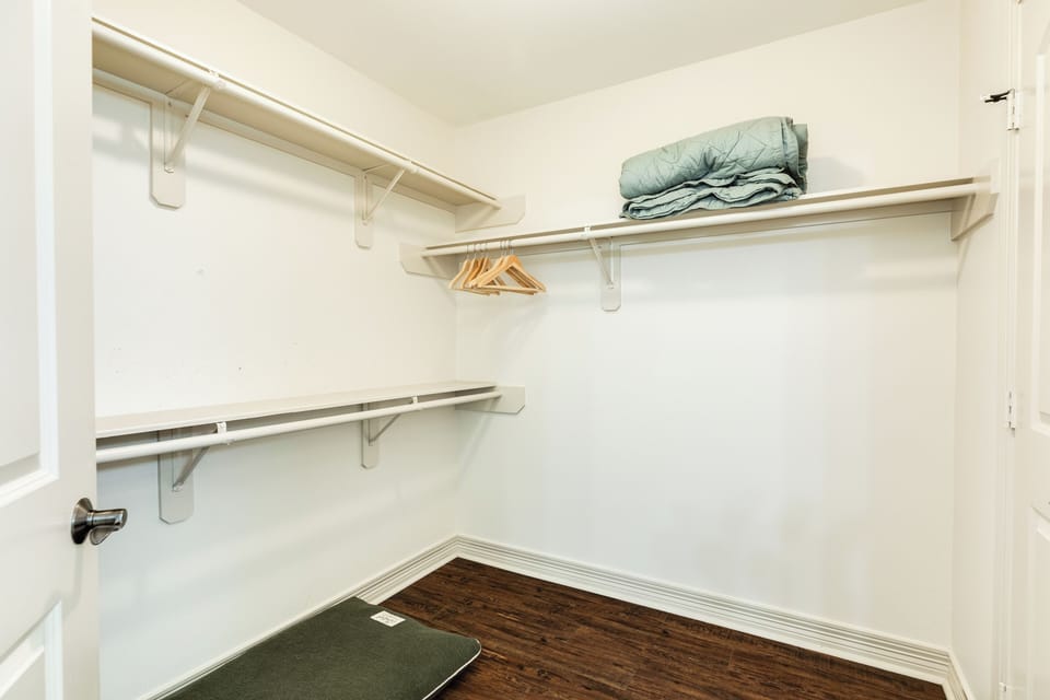 Spacious walk-in closet in the primary bedroom