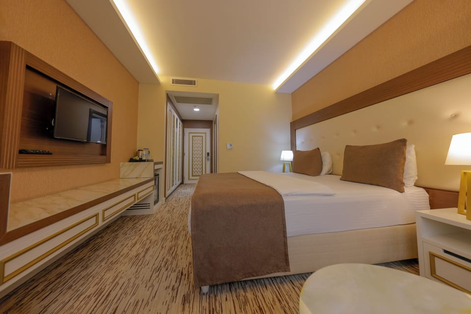 Premium bedding, memory foam beds, minibar, in-room safe